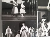 black and white photograph of a group of people performing in a ballet class