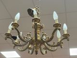 a chandelier that is hanging from the ceiling
