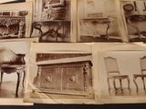 several old photographs of antique furniture are displayed on a table