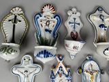 many different types of decorative vases on the table