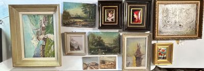 many framed pictures on the wall of a room