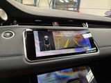 a picture of a car dashboard with a cell phone in it