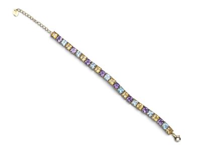 a close up of a bracelet on a white background