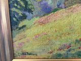 an oil painting of a field with flowers and trees in a gold frame