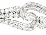 une photo d'une bague sertie d'un diamant