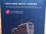 a close up of a box of a camera on a table