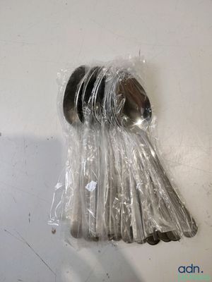 a plastic bag wrapped around a metal object on the wall