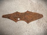 a close up of a piece of rust on the ground