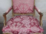 an image of a pink chair with gold trim and a pink upholstered seat