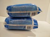 two bags of toilet paper sitting on top of each other