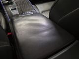 a cell phone sitting in the center of a car seat
