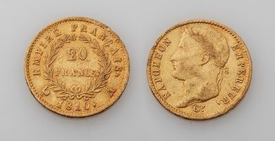 two gold sovereigns, one of which has a bust and the other of which is a bust