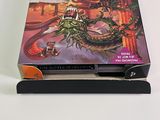 a book that is sitting on top of a book stand