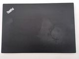 a black mouse pad with a picture of a cat on it
