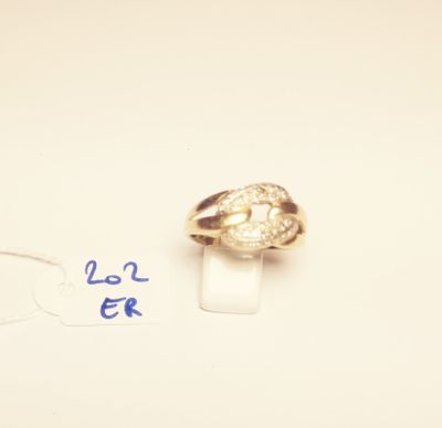 a gold ring with a diamond on top of it