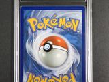 a close up of a pokemon card on a table