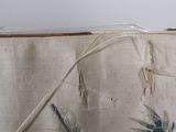 a close up of a piece of fabric with birds on it
