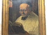 an old painting of a man reading a book in a wooden frame