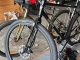 a bike that is sitting on a stand in a garage