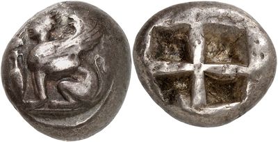 a silver coin with a cross and a man on it