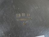 a metal object that has a sticker on it