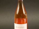 a bottle of wine that is sitting on a table