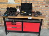 a workbench with tools on top of it in a garage