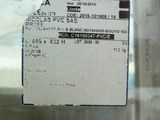 a label on the glass of a machine that is in use
