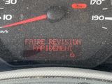 a close up of a speedometer on the dashboard of a car
