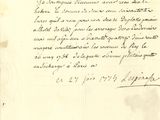 une vieille lettre écrite à l'encre noire sur un bout de papier