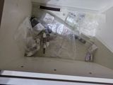 a picture of a sink with a lot of items inside of it