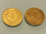 two gold coins, one of which is a sovereign and the other of which is a sovereign