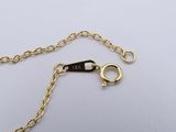 a close up of a gold chain with a lock on it