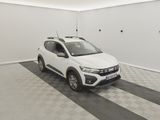 a white car that is parked in a garage