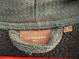 a close up of a purse with a label on it
