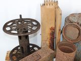 many different types of rusted metal items on the table