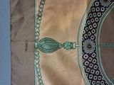 a picture of a table cloth with a design on it
