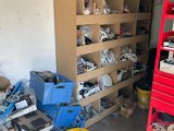 a room with a bunch of boxes and a red shelf