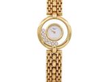 a close up of a gold watch with diamonds on a white background