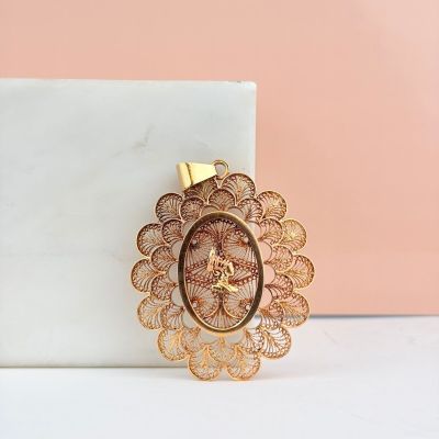 vintage gold filigree brooch pin with filigree flower design