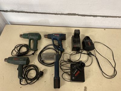 a lot of tools that are sitting on the floor