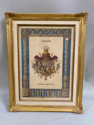 a framed picture of a coat of arms with a gold frame