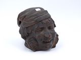 an image of a statue of a man with a hat on his head