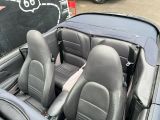 a picture of a car with leather seats in the back of it