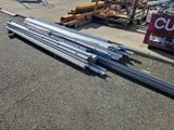 a lot of steel bars on the ground in a parking lot