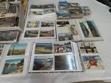 a table with many cards and pictures on it