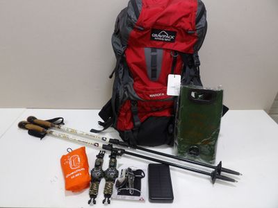 a red backpack and a pair of skis and a pair of ski poles