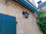 a light that is on the side of a building
