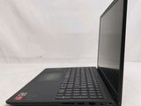 the back of a laptop computer sitting on top of a white table