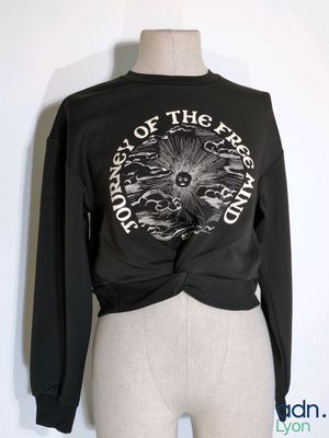 a close up of a mannequin torso with a shirt on it